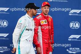 (L to R): Lewis Hamilton (GBR) Mercedes AMG F1 and Sebastian Vettel (GER) Ferrari in qualifying parc ferme. 28.04.2018. Formula 1 World Championship, Rd 4, Azerbaijan Grand Prix, Baku Street Circuit, Azerbaijan, Qualifying Day.
