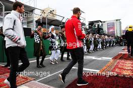 Sebastian Vettel (GER) Ferrari and Romain Grosjean (FRA) Haas F1 Team on the drivers parade. 29.04.2018. Formula 1 World Championship, Rd 4, Azerbaijan Grand Prix, Baku Street Circuit, Azerbaijan, Race Day.
