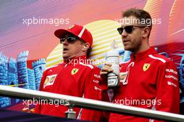 (L to R): Kimi Raikkonen (FIN) Ferrari and Sebastian Vettel (GER) Ferrari on the drivers parade. 29.04.2018. Formula 1 World Championship, Rd 4, Azerbaijan Grand Prix, Baku Street Circuit, Azerbaijan, Race Day.