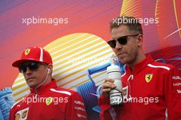 Sebastian Vettel (GER) Scuderia Ferrari and Kimi Raikkonen (FIN) Scuderia Ferrari  29.04.2018. Formula 1 World Championship, Rd 4, Azerbaijan Grand Prix, Baku Street Circuit, Azerbaijan, Race Day.