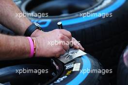 A Sahara Force India F1 Team mechanic with Pirelli tyres. 26.04.2018. Formula 1 World Championship, Rd 4, Azerbaijan Grand Prix, Baku Street Circuit, Azerbaijan, Preparation Day.