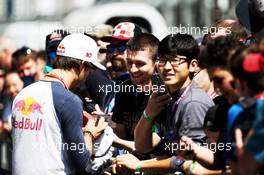 Pierre Gasly (FRA) Scuderia Toro Rosso signs autographs for the fans. 26.04.2018. Formula 1 World Championship, Rd 4, Azerbaijan Grand Prix, Baku Street Circuit, Azerbaijan, Preparation Day.