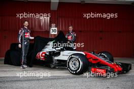 (L to R): Romain Grosjean (FRA) Haas F1 Team and Kevin Magnussen (DEN) Haas F1 Team reveal the Haas VF-18. 26.02.2018. Formula One Testing, Day One, Barcelona, Spain. Monday.
