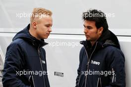 (L to R): Nikita Mazepin (RUS) Sahara Force India F1 Team Development Driver with Sergio Perez (MEX) Sahara Force India F1. 26.02.2018. Formula One Testing, Day One, Barcelona, Spain. Monday.