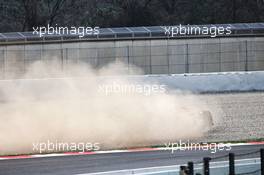Fernando Alonso (ESP) McLaren MCL33 spins into the gravel with a wheel missing. 26.02.2018. Formula One Testing, Day One, Barcelona, Spain. Monday.