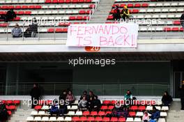 A banner for Fernando Alonso (ESP) McLaren with fans in the grandstand. 26.02.2018. Formula One Testing, Day One, Barcelona, Spain. Monday.
