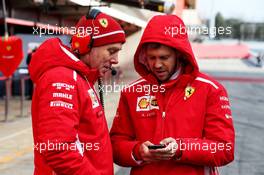 (L to R): Jock Clear (GBR) Ferrari Engineering Director with Sebastian Vettel (GER) Ferrari. 27.02.2018. Formula One Testing, Day Two, Barcelona, Spain. Tuesday.
