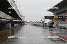 A wet and empty pit lane. 28.02.2018. Formula One Testing, Day Three, Barcelona, Spain. Wednesday.