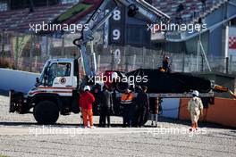 The McLaren MCL33 of Fernando Alonso (ESP) McLaren is recovered back to the pits on the back of a truck. 09.03.2018. Formula One Testing, Day Four, Barcelona, Spain. Friday.