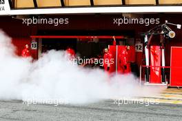 Sebastian Vettel (GER) Ferrari SF71H with smoke coming from a pipe at the side of the pit garage. 08.03.2018. Formula One Testing, Day Three, Barcelona, Spain. Thursday.