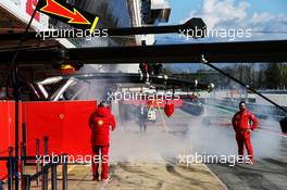 Smoke coming from the Ferrari garage. 07.03.2018. Formula One Testing, Day Two, Barcelona, Spain. Wednesday.