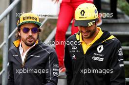 (L to R): Fernando Alonso (ESP) McLaren with Carlos Sainz Jr (ESP) Renault Sport F1 Team. 24.08.2018. Formula 1 World Championship, Rd 13, Belgian Grand Prix, Spa Francorchamps, Belgium, Practice Day.