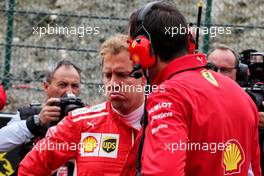 Sebastian Vettel (GER) Ferrari on the grid. 26.08.2018. Formula 1 World Championship, Rd 13, Belgian Grand Prix, Spa Francorchamps, Belgium, Race Day.