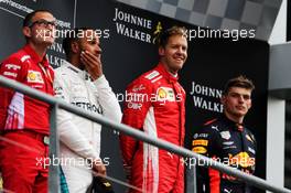 The podium (L to R): Lewis Hamilton (GBR) Mercedes AMG F1, second; Sebastian Vettel (GER) Ferrari, race winner; Max Verstappen (NLD) Red Bull Racing, third. 26.08.2018. Formula 1 World Championship, Rd 13, Belgian Grand Prix, Spa Francorchamps, Belgium, Race Day.