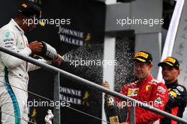 (L to R): Lewis Hamilton (GBR) Mercedes AMG F1 and race winner Sebastian Vettel (GER) Ferrari celebrate on the podium. 26.08.2018. Formula 1 World Championship, Rd 13, Belgian Grand Prix, Spa Francorchamps, Belgium, Race Day.