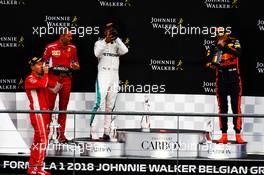 The podium (L to R): Race winner Sebastian Vettel (GER) Ferrari celebrates with Lewis Hamilton (GBR) Mercedes AMG F1 and Max Verstappen (NLD) Red Bull Racing. 26.08.2018. Formula 1 World Championship, Rd 13, Belgian Grand Prix, Spa Francorchamps, Belgium, Race Day.
