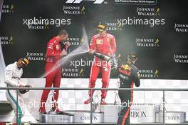 The podium (L to R): Lewis Hamilton (GBR) Mercedes AMG F1, second; Sebastian Vettel (GER) Ferrari, race winner; Max Verstappen (NLD) Red Bull Racing, third. 26.08.2018. Formula 1 World Championship, Rd 13, Belgian Grand Prix, Spa Francorchamps, Belgium, Race Day.