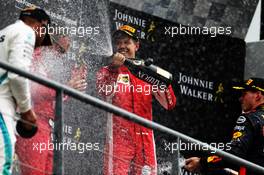 Race winner Sebastian Vettel (GER) Ferrari celebrates on the podium. 26.08.2018. Formula 1 World Championship, Rd 13, Belgian Grand Prix, Spa Francorchamps, Belgium, Race Day.