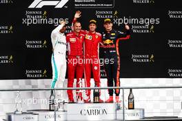 The podium (L to R): Lewis Hamilton (GBR) Mercedes AMG F1, second; Sebastian Vettel (GER) Ferrari, race winner; Max Verstappen (NLD) Red Bull Racing, third. 26.08.2018. Formula 1 World Championship, Rd 13, Belgian Grand Prix, Spa Francorchamps, Belgium, Race Day.
