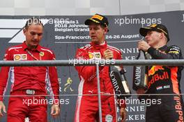 Race winner Sebastian Vettel (GER) Ferrari celebrates on the podium with Max Verstappen (NLD) Red Bull Racing. 26.08.2018. Formula 1 World Championship, Rd 13, Belgian Grand Prix, Spa Francorchamps, Belgium, Race Day.