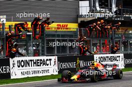Max Verstappen (NLD) Red Bull Racing RB14 celebrates third position at the end of the race with the team. 26.08.2018. Formula 1 World Championship, Rd 13, Belgian Grand Prix, Spa Francorchamps, Belgium, Race Day.