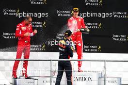 Max Verstappen (NLD) Red Bull Racing and race winner Sebastian Vettel (GER) Ferrari celebrates on the podium. 26.08.2018. Formula 1 World Championship, Rd 13, Belgian Grand Prix, Spa Francorchamps, Belgium, Race Day.