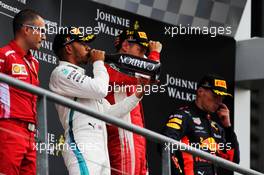 The podium (L to R): Lewis Hamilton (GBR) Mercedes AMG F1, second; Sebastian Vettel (GER) Ferrari, race winner; Max Verstappen (NLD) Red Bull Racing, third. 26.08.2018. Formula 1 World Championship, Rd 13, Belgian Grand Prix, Spa Francorchamps, Belgium, Race Day.