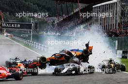 Fernando Alonso (ESP) McLaren MCL33 crashes with Charles Leclerc (MON) Sauber F1 Team C37 and Nico Hulkenberg (GER) Renault Sport F1 Team RS18 at the start of the race. 26.08.2018. Formula 1 World Championship, Rd 13, Belgian Grand Prix, Spa Francorchamps, Belgium, Race Day.