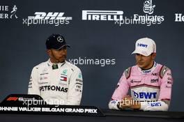 (L to R): Lewis Hamilton (GBR) Mercedes AMG F1 and Esteban Ocon (FRA) Racing Point Force India F1 Team in the post qualifying FIA Press Conference. 25.08.2018. Formula 1 World Championship, Rd 13, Belgian Grand Prix, Spa Francorchamps, Belgium, Qualifying Day.
