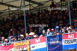 Max Verstappen (NLD) Red Bull Racing fans in the grandstand.