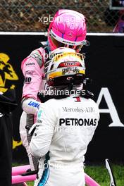 Lewis Hamilton (GBR) Mercedes AMG F1 celebrates his pole position in qualifying parc ferme with third placed Esteban Ocon (FRA) Racing Point Force India F1 Team. 25.08.2018. Formula 1 World Championship, Rd 13, Belgian Grand Prix, Spa Francorchamps, Belgium, Qualifying Day.