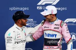 (L to R): Lewis Hamilton (GBR) Mercedes AMG F1 celebrates his pole position with third placed Esteban Ocon (FRA) Racing Point Force India F1 Team in qualifying parc ferme. 25.08.2018. Formula 1 World Championship, Rd 13, Belgian Grand Prix, Spa Francorchamps, Belgium, Qualifying Day.