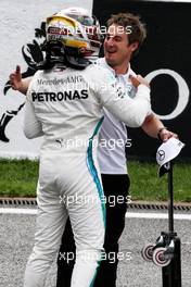 Lewis Hamilton (GBR) Mercedes AMG F1 celebrates his pole position in qualifying parc ferme. 25.08.2018. Formula 1 World Championship, Rd 13, Belgian Grand Prix, Spa Francorchamps, Belgium, Qualifying Day.