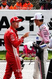 (L to R): second placed Sebastian Vettel (GER) Ferrari with third placed Esteban Ocon (FRA) Racing Point Force India F1 Team in qualifying parc ferme. 25.08.2018. Formula 1 World Championship, Rd 13, Belgian Grand Prix, Spa Francorchamps, Belgium, Qualifying Day.