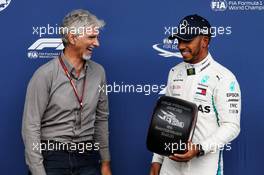 Lewis Hamilton (GBR) Mercedes AMG F1 receives the Pirelli Pole Position award from Damon Hill (GBR) Sky Sports Presenter. 25.08.2018. Formula 1 World Championship, Rd 13, Belgian Grand Prix, Spa Francorchamps, Belgium, Qualifying Day.