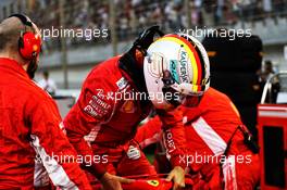Sebastian Vettel (GER) Ferrari SF71H on the grid. 08.04.2018. Formula 1 World Championship, Rd 2, Bahrain Grand Prix, Sakhir, Bahrain, Race Day.