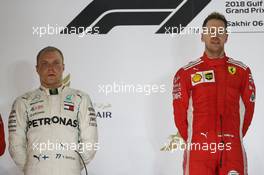 Valtteri Bottas (FIN) Mercedes AMG F1 and Sebastian Vettel (GER) Ferrari SF71H. 08.04.2018. Formula 1 World Championship, Rd 2, Bahrain Grand Prix, Sakhir, Bahrain, Race Day.