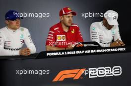 The post race FIA Press Conference (L to R): Valtteri Bottas (FIN) Mercedes AMG F1, second; Sebastian Vettel (GER) Ferrari, race winner; Lewis Hamilton (GBR) Mercedes AMG F1, third. 08.04.2018. Formula 1 World Championship, Rd 2, Bahrain Grand Prix, Sakhir, Bahrain, Race Day.