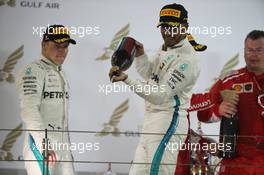 1st place Sebastian Vettel (GER) Ferrari SF71H, 2nd Valtteri Bottas (FIN) Mercedes AMG F1 and 3rd place Lewis Hamilton (GBR) Mercedes AMG F1 W09. 08.04.2018. Formula 1 World Championship, Rd 2, Bahrain Grand Prix, Sakhir, Bahrain, Race Day.