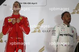 1st place for Sebastian Vettel (GER) Ferrari SF71H, 2nd for Lewis Hamilton (GBR) Mercedes AMG F1 W09. 08.04.2018. Formula 1 World Championship, Rd 2, Bahrain Grand Prix, Sakhir, Bahrain, Race Day.