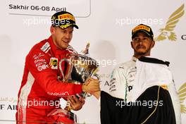 Race winner Sebastian Vettel (GER) Ferrari celebrates on the podium. 08.04.2018. Formula 1 World Championship, Rd 2, Bahrain Grand Prix, Sakhir, Bahrain, Race Day.