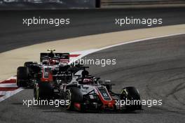Romain Grosjean (FRA) Haas F1 Team VF-18 leads team mate Kevin Magnussen (DEN) Haas VF-18. 08.04.2018. Formula 1 World Championship, Rd 2, Bahrain Grand Prix, Sakhir, Bahrain, Race Day.