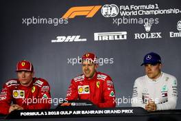 The post qualifying FIA Press Conference (L to R): Kimi Raikkonen (FIN) Ferrari, second; Sebastian Vettel (GER) Ferrari, pole position; Valtteri Bottas (FIN) Mercedes AMG F1, third. 07.04.2018. Formula 1 World Championship, Rd 2, Bahrain Grand Prix, Sakhir, Bahrain, Qualifying Day.