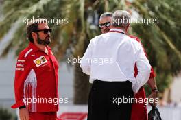 (L to R): Gino Rosato (CDN) Ferrari with Maurizio Arrivabene (ITA) Ferrari Team Principal and Ross Brawn (GBR) Managing Director, Motor Sports. 07.04.2018. Formula 1 World Championship, Rd 2, Bahrain Grand Prix, Sakhir, Bahrain, Qualifying Day.