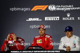 The post qualifying FIA Press Conference (L to R): Kimi Raikkonen (FIN) Ferrari, second; Sebastian Vettel (GER) Ferrari, pole position; Valtteri Bottas (FIN) Mercedes AMG F1, third. 07.04.2018. Formula 1 World Championship, Rd 2, Bahrain Grand Prix, Sakhir, Bahrain, Qualifying Day.