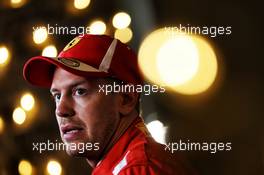 Sebastian Vettel (GER) Ferrari with the media. 07.04.2018. Formula 1 World Championship, Rd 2, Bahrain Grand Prix, Sakhir, Bahrain, Qualifying Day.