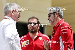 (L to R): Ross Brawn (GBR) Managing Director, Motor Sports with Gino Rosato (CDN) Ferrari and Maurizio Arrivabene (ITA) Ferrari Team Principal. 07.04.2018. Formula 1 World Championship, Rd 2, Bahrain Grand Prix, Sakhir, Bahrain, Qualifying Day.