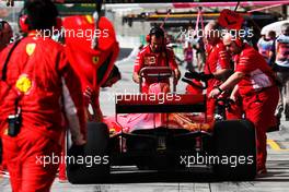 Sebastian Vettel (GER) Ferrari SF71H in the pits.