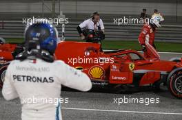 Pole for Sebastian Vettel (GER) Ferrari SF71H and 3rd Valtteri Bottas (FIN) Mercedes AMG F1. 07.04.2018. Formula 1 World Championship, Rd 2, Bahrain Grand Prix, Sakhir, Bahrain, Qualifying Day.