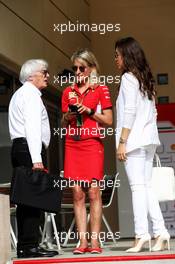 (L to R): Bernie Ecclestone (GBR) with Britta Roeske (AUT) Ferrari Press Officer and Fabiana Flosi (BRA). 08.04.2018. Formula 1 World Championship, Rd 2, Bahrain Grand Prix, Sakhir, Bahrain, Race Day.